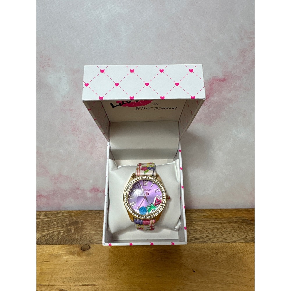 Luv Betsey by Betsey Johnson Sunray Dial Floating Charms Watch
